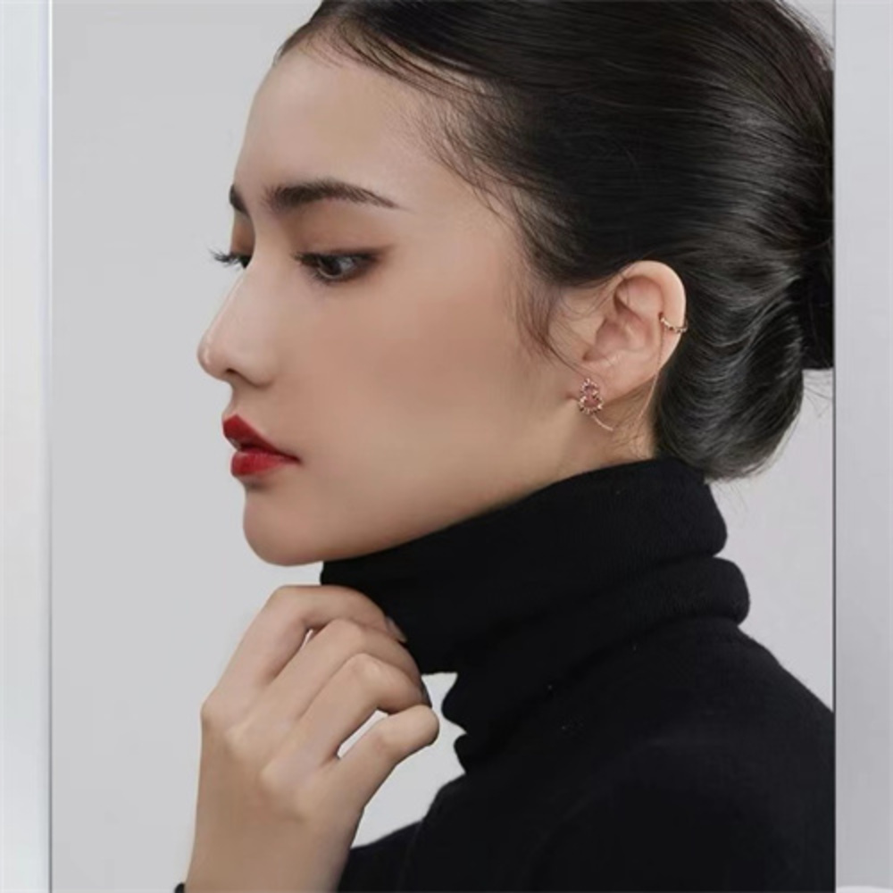 Simple line depiction of Qeelin gourd earrings